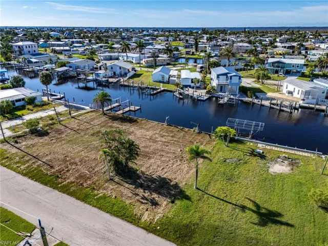 Aerial view of residential area with a nearby body of water