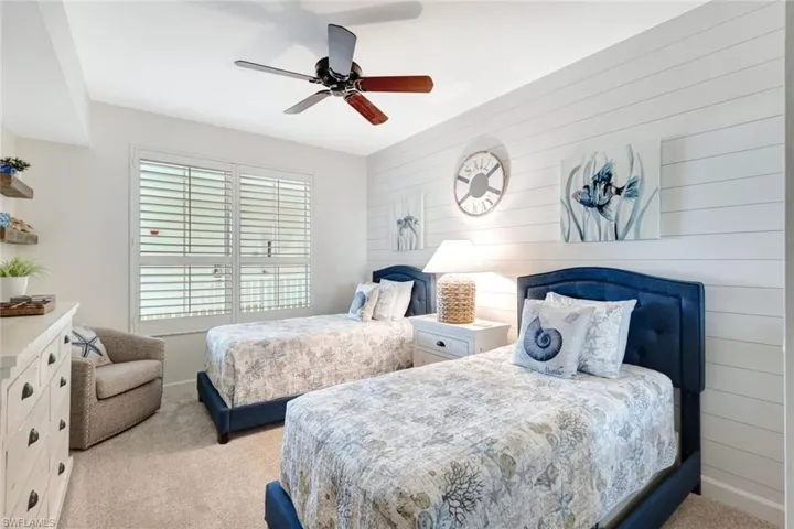 Guest bedroom with shiplap accent wall