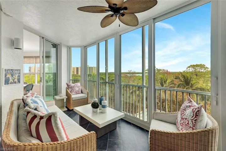 Lanai with new exterior glass sliders & views to the Bay & Gulf