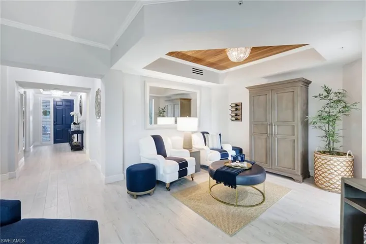 Sitting Area with tray ceiling & bar cabinet