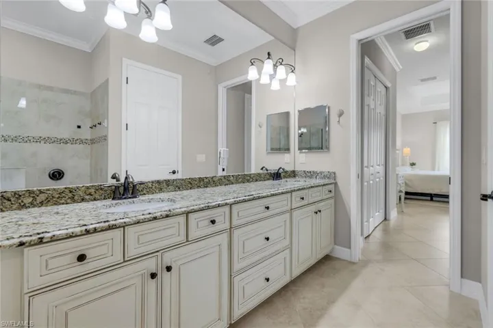 Double sinks, shower and tub