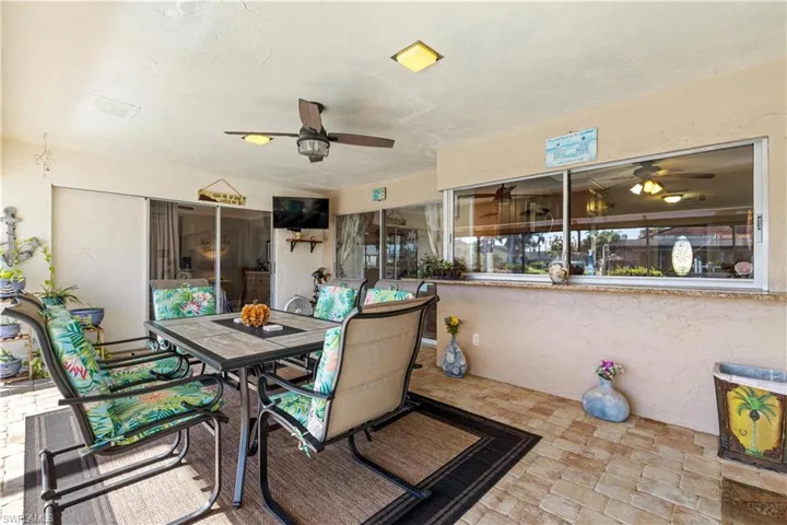 View of patio / terrace featuring ceiling fan