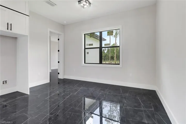 Breakfast area off the kitchen featuring tile flooring