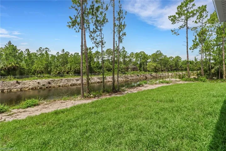 View of landscaped backyard