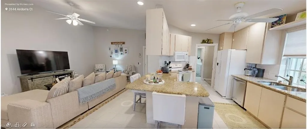 Bathroom featuring double vanity, visible vents, and a sink