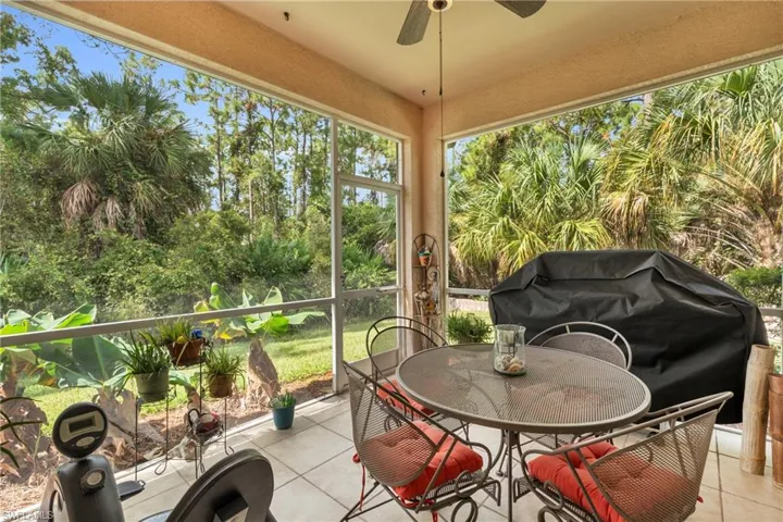 Sunroom featuring ceiling fan