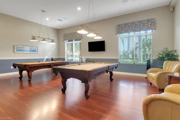 Recreation room with billiards table, wood finished floors, and recessed lighting