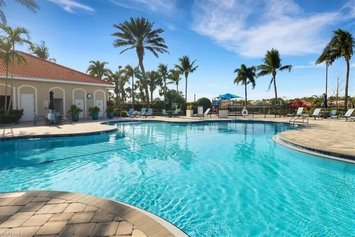 Community pool with a patio area
