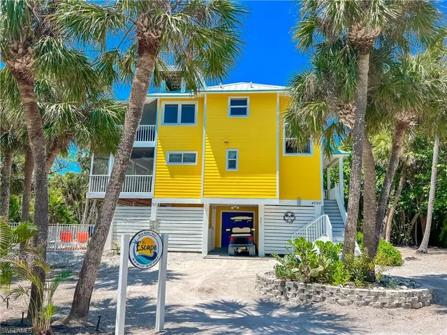 View of building exterior with a garage