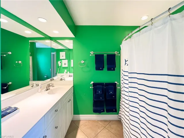 Bathroom with tile floors and vanity