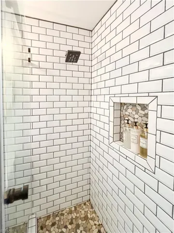 Bathroom with tiled shower
