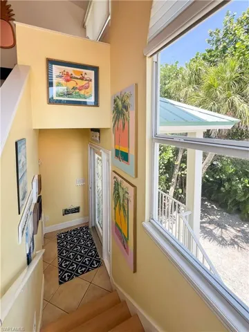 Foyer entrance with tile flooring and a wealth of natural light