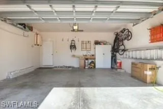 Large 2 car garage, storage cabinet and work bench