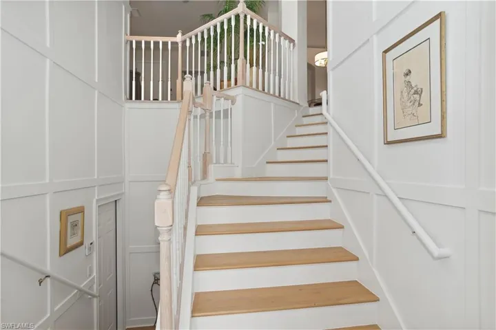 Custom open staircase with oak stairs.