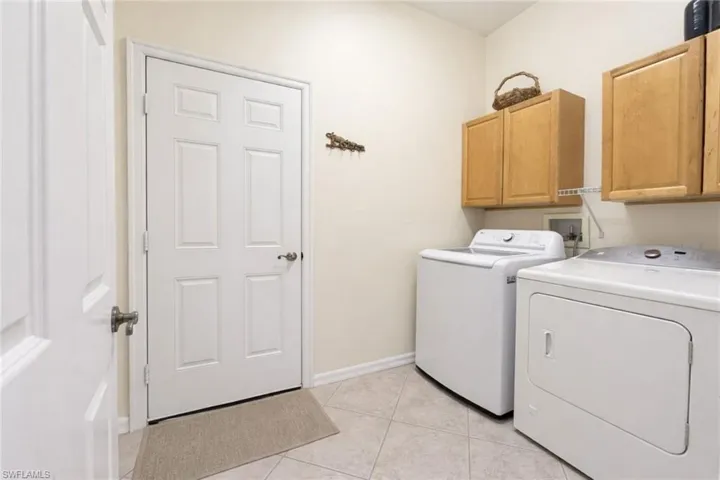 Built-in cabinetry with wood-finish doors and dark countertops
