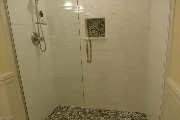 Bathroom with a tile shower