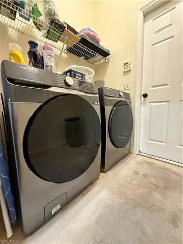 Laundry area with washing machine and dryer