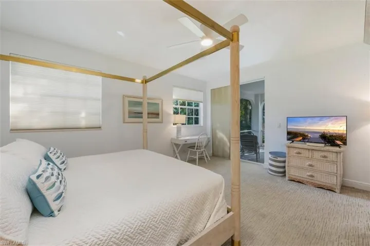 Bedroom featuring carpet and a ceiling fan