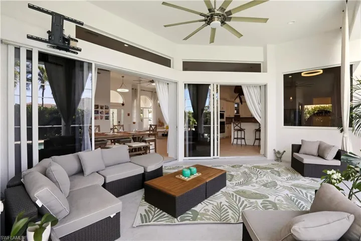 Living room featuring ceiling fan