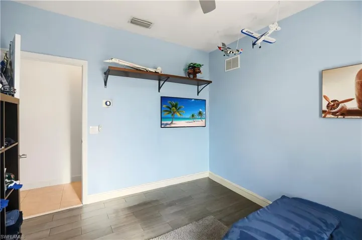 Living area featuring wood finished floors and baseboards