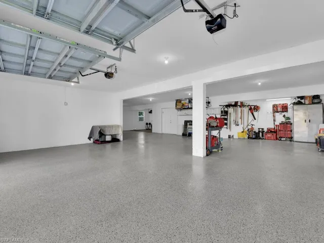 Garage featuring a epoxy flooring