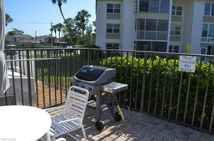 Balcony featuring a grill