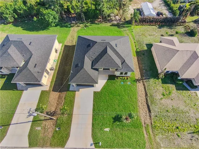 Aerial view of property and surrounding area