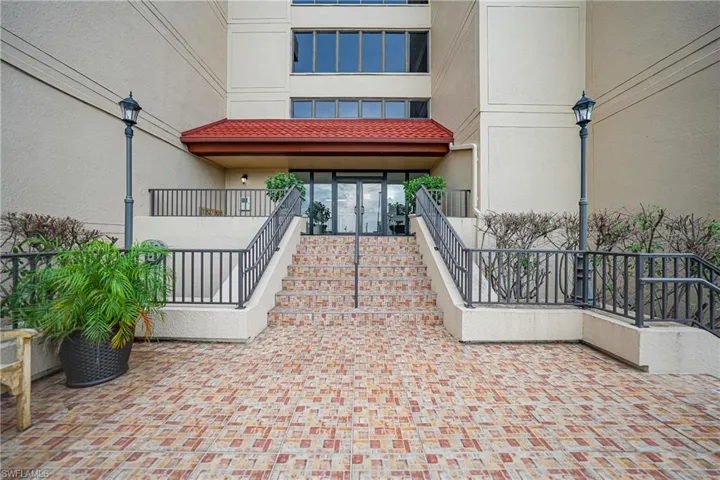 View of exterior entry featuring french doors