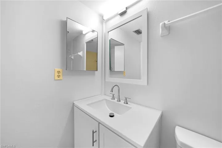 Bathroom featuring toilet and vanity