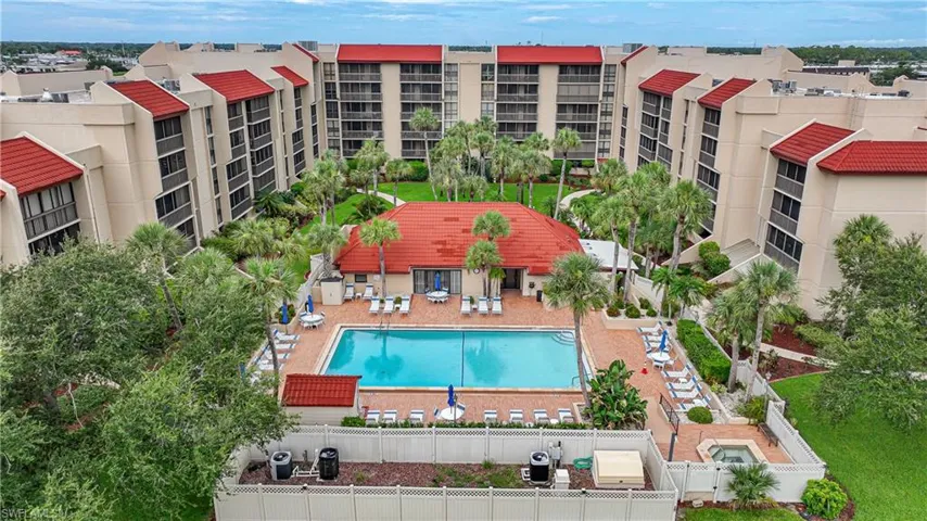 View of swimming pool featuring cooling unit