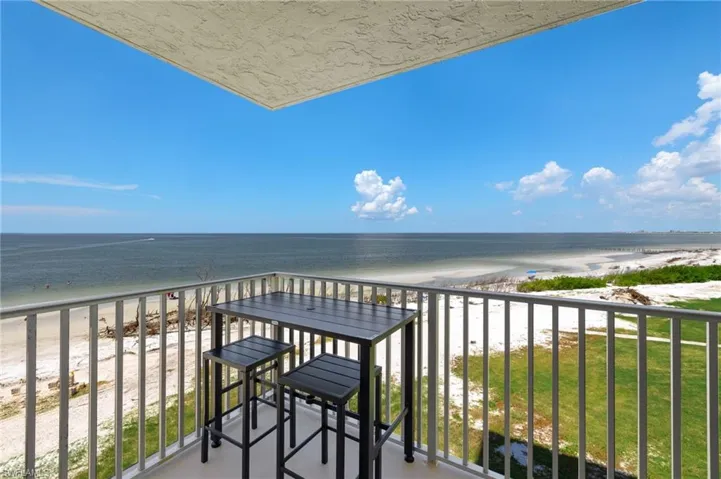 Balcony featuring a beach view