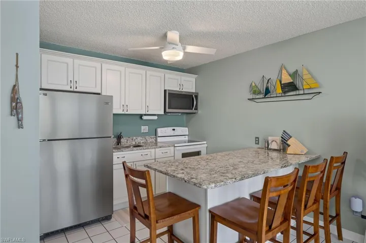 Kitchen featuring kitchen island