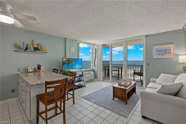 Living room with gulf view and kitchen island