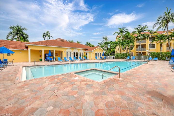 pool area with clubhouse