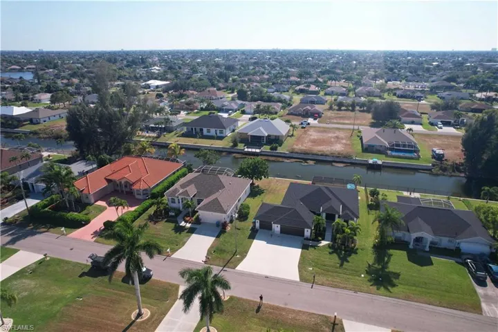 Aerial view of residential area with a nearby body of water