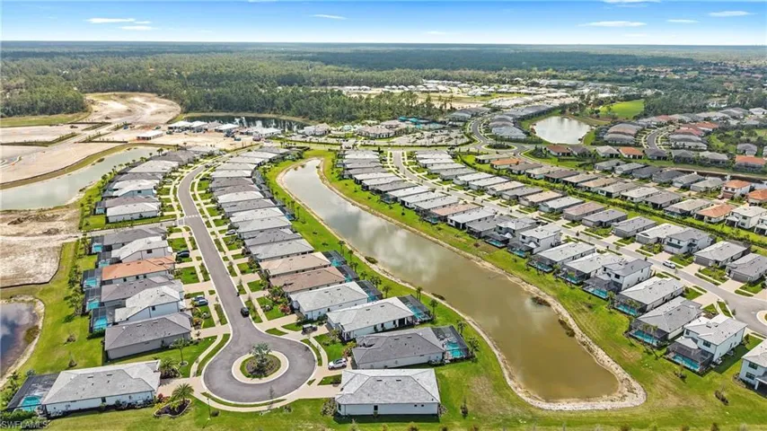 Aerial overview of property's location with nearby suburban area