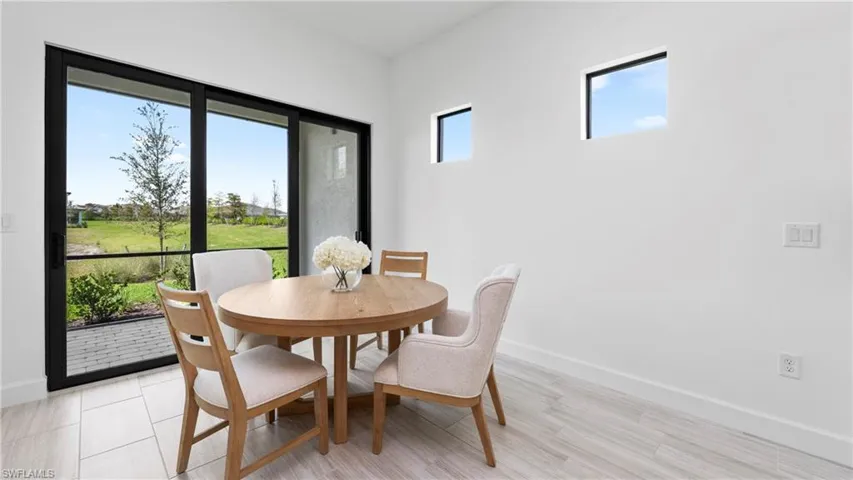 Dining area featuring baseboards