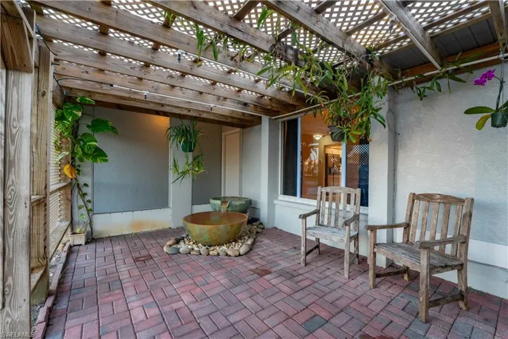 View of patio with a pergola