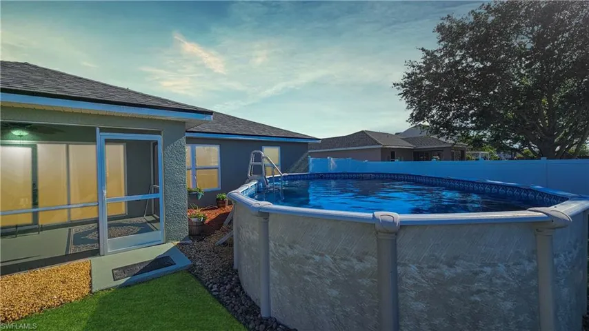 View of pool featuring a fenced in pool and a fenced backyard