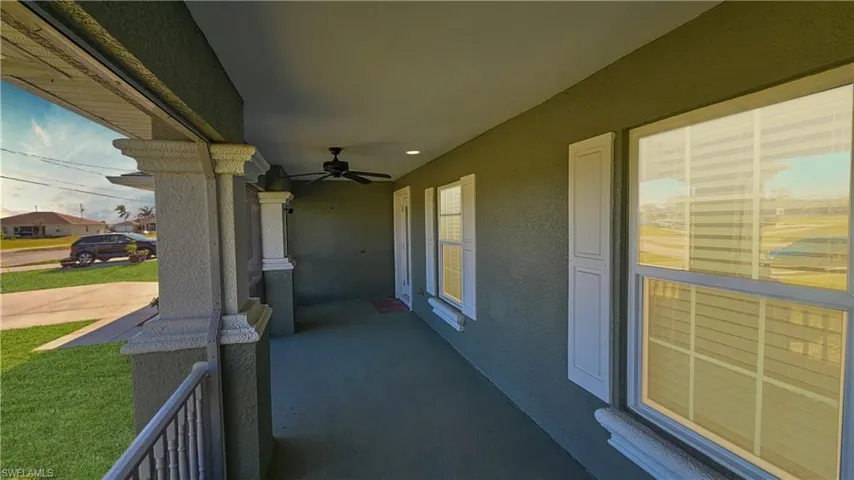 View of patio / terrace with a ceiling fan