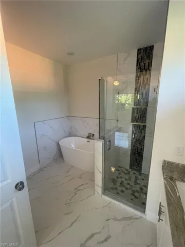 Bathroom featuring tile patterned floors