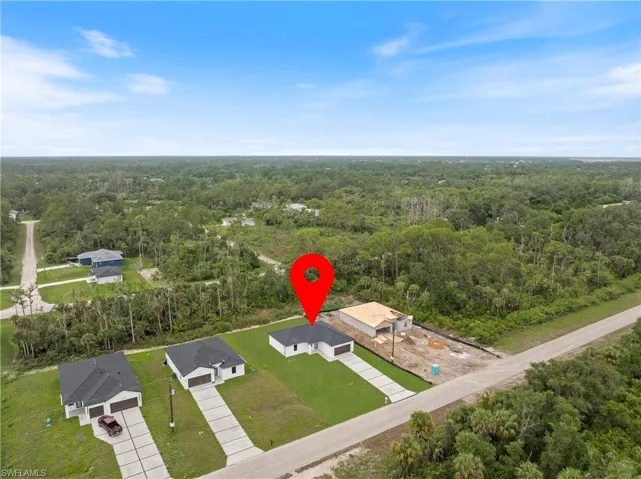 Drone / aerial view of a heavily wooded area