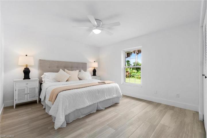 guest bedroom featuring king-size bed