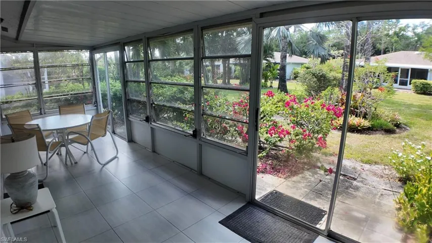 Enjoy the greenery and flowers from the living room or the lanai.