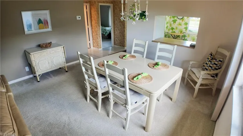 Natural light streams in from 3 sides .