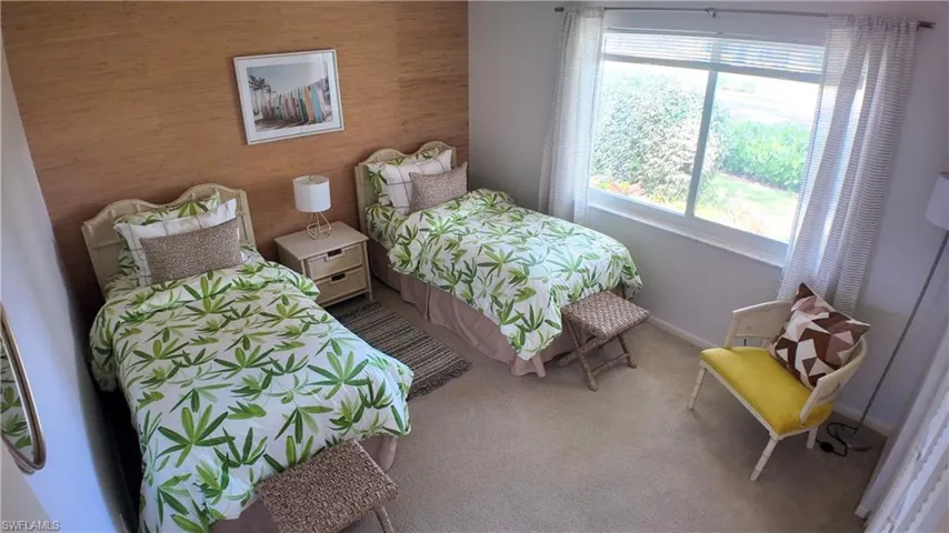 This bedroom is on the front of the home. The primary bedroom is on the back of the home. Nice for guests!