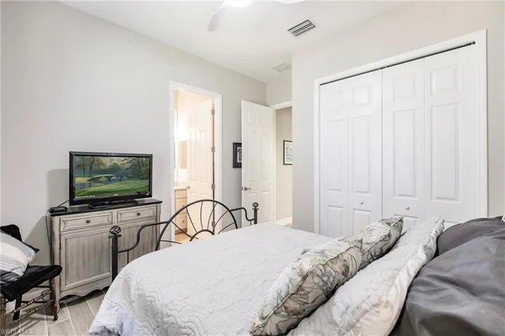 Guest bedroom featuring an ensuite bathroom