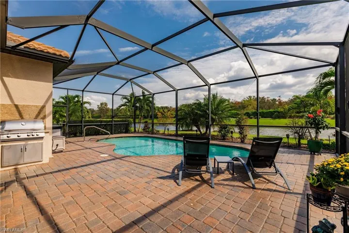 View of pool featuring and a water view