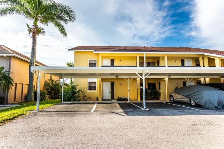 View of front of home featuring a carport