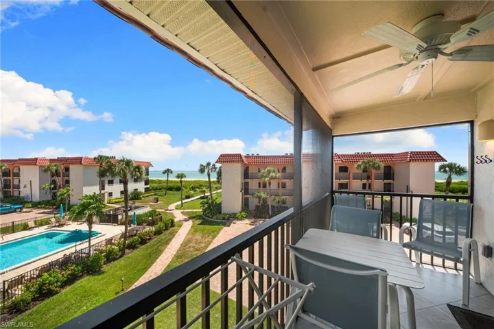 Screened balcony with ceiling fan
